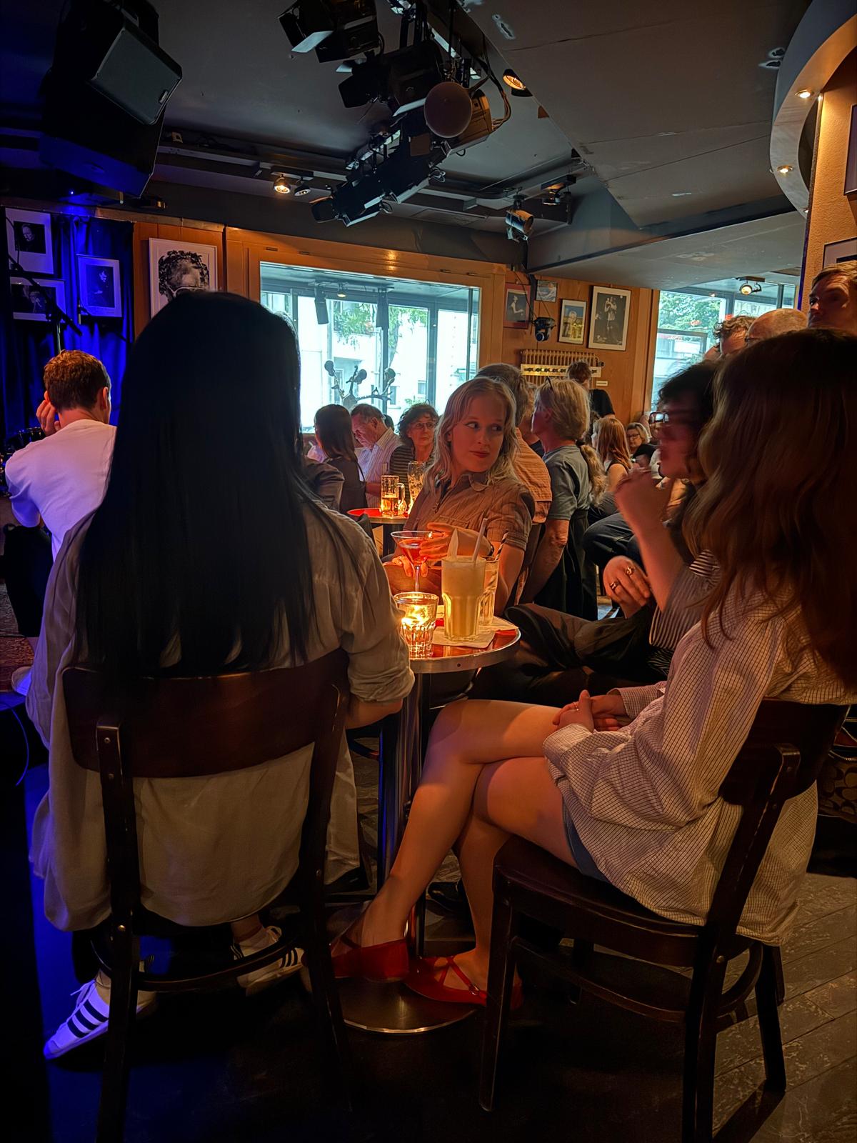 Sitting at a resturant talking with friends