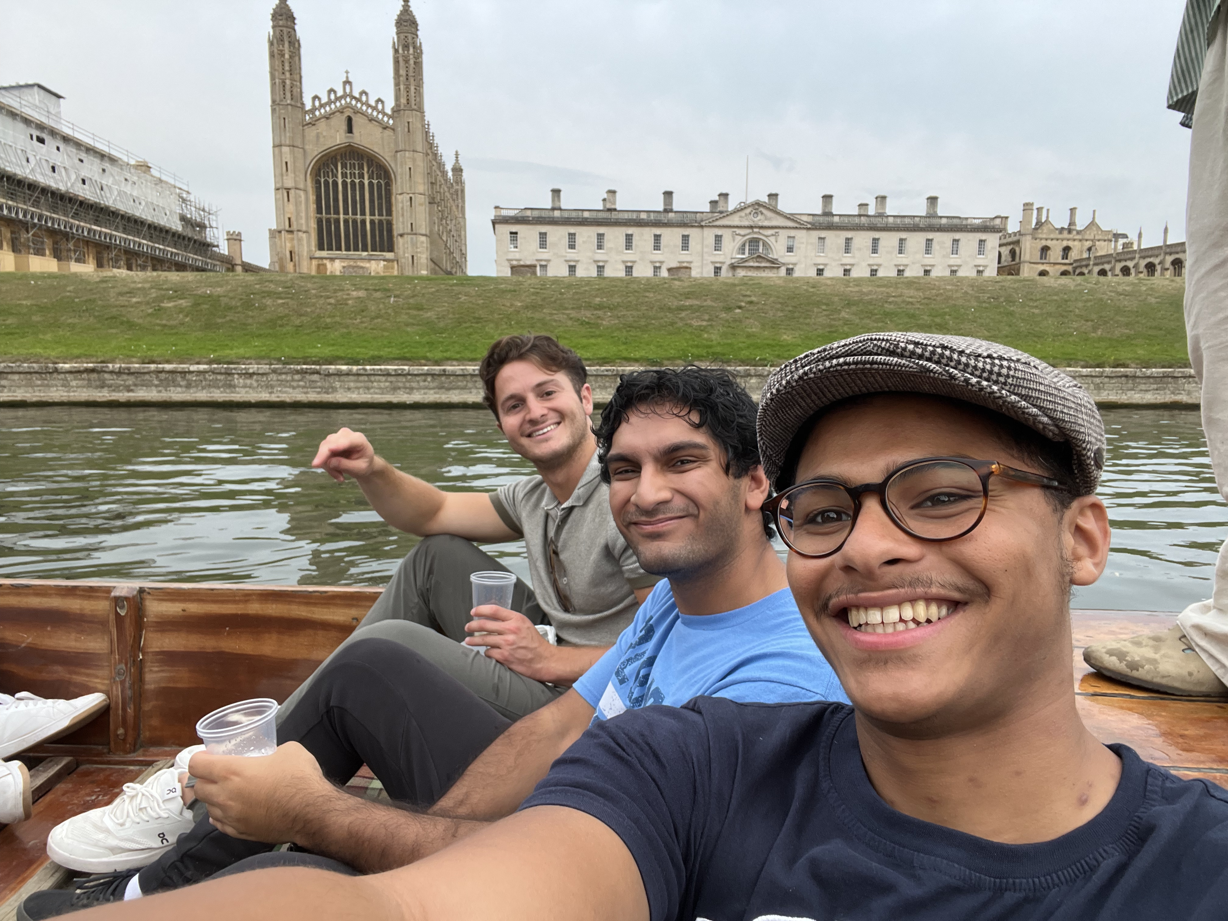 Albaraa Gebril with friends on a boat floating during a river near Cambridge