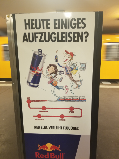 In the U-Bahn of Berlin a photo of a Red Bull advertisement