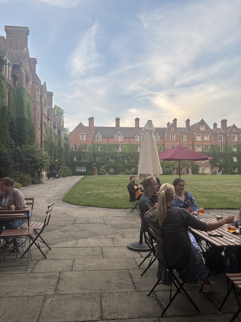 Sitting in a courtyard at Cambridge