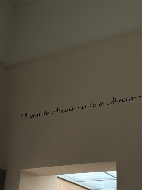 A quote on a wall that read" I went to Athens-as to a Mecca"