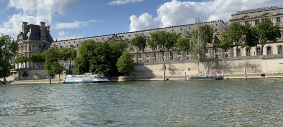 A photo looking across on the Seine river in Paris