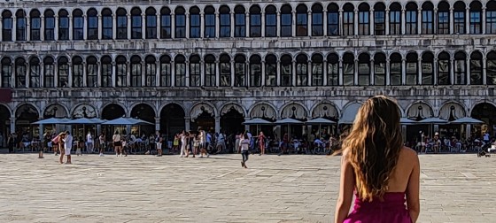 Katrina at St. Mark’s Square (Piazza San Marco), Venice, facing the Procuratie Vecchie.