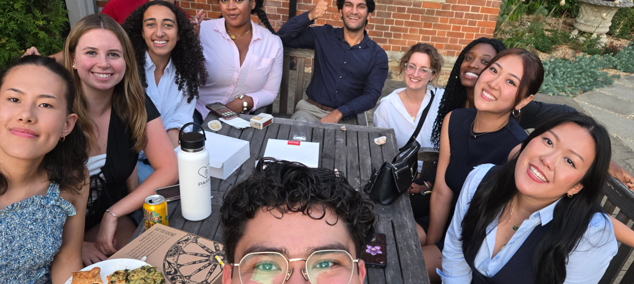 Oscar sitting with the GLOBES cohort eating lunch