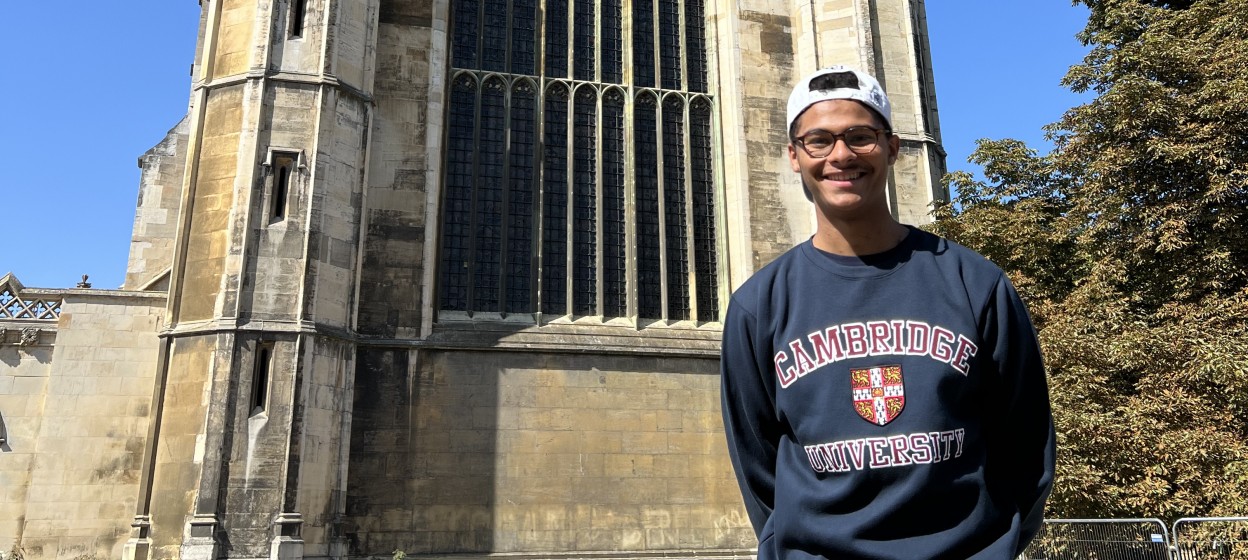 Albaraa Gebril standing in front of a building at Cambridge