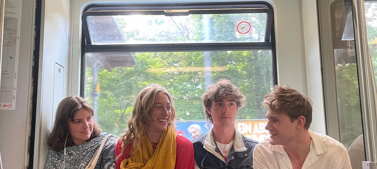 Students sitting on the U Bahn in Berlin