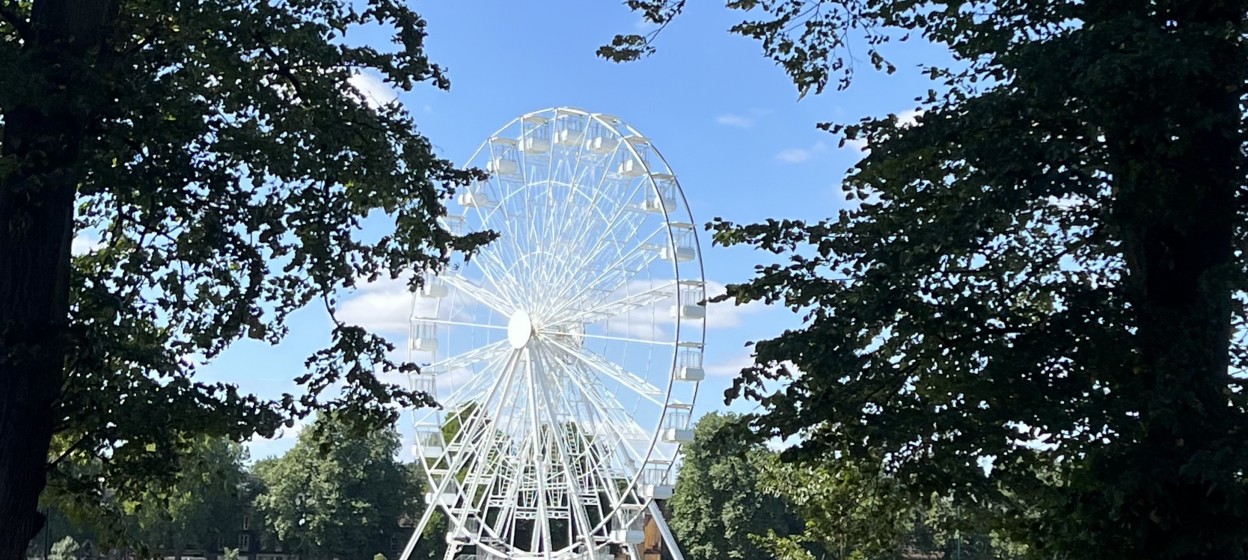 A park with a ferris wheel in Cambridge U.K.