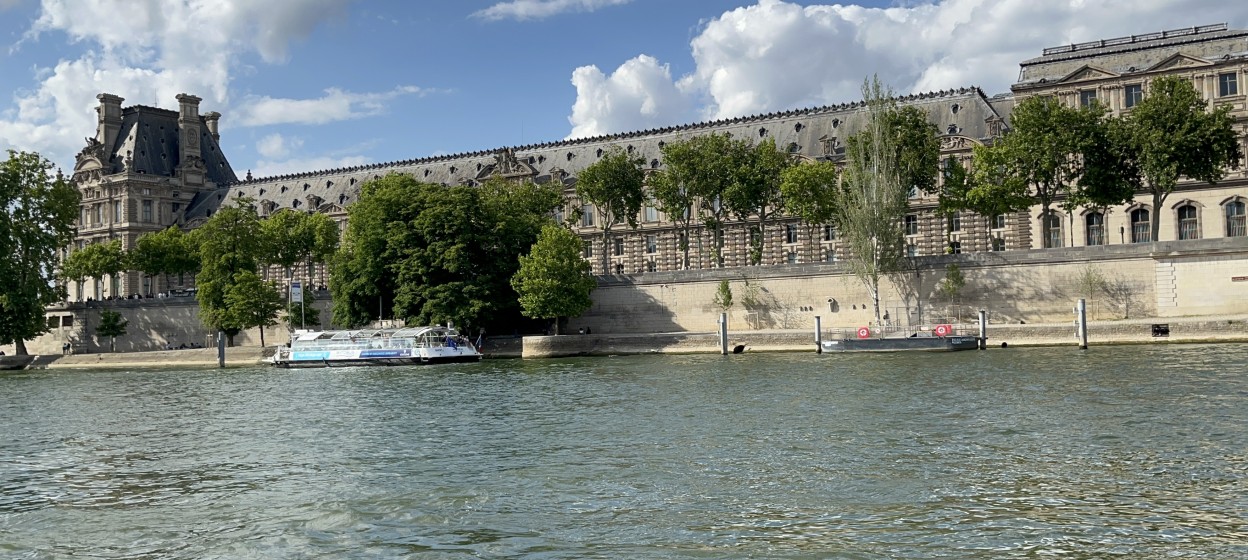 A photo looking across on the Seine river in Paris