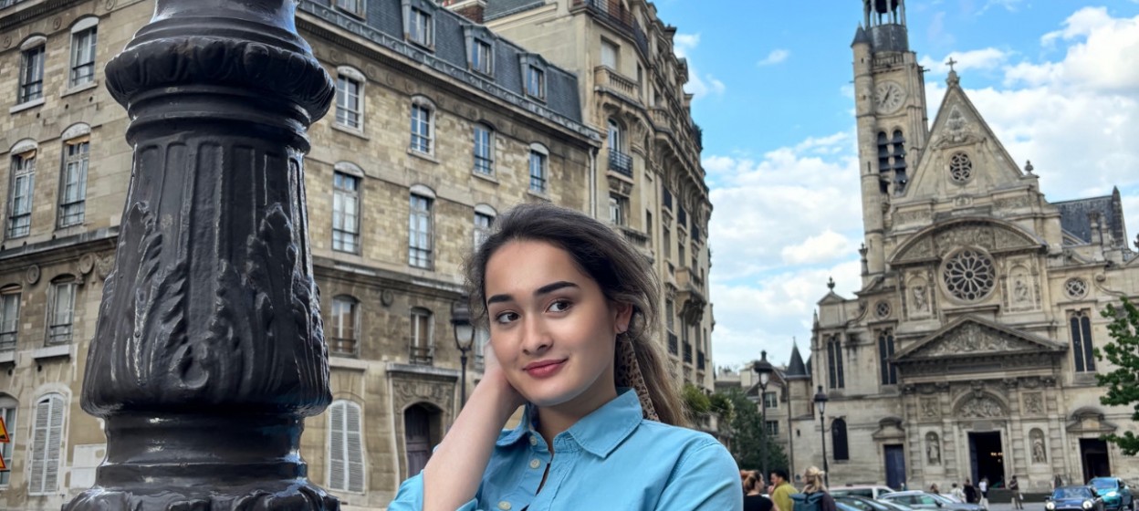 Katrina Rose Machett smiling to the camera in Paris