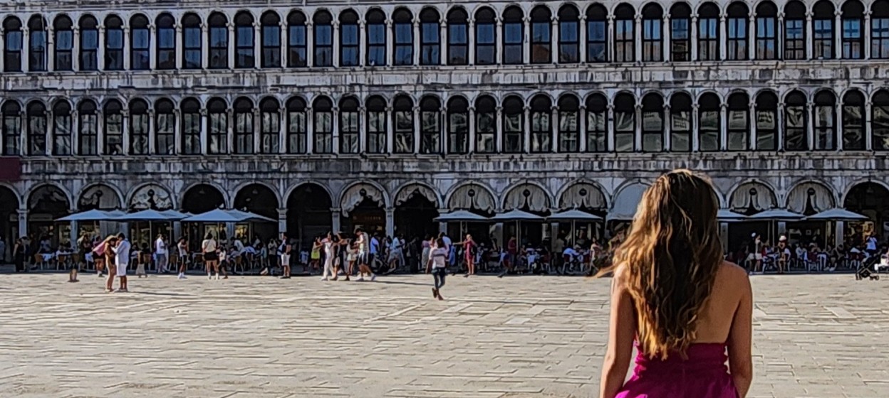 Katrina at St. Mark’s Square (Piazza San Marco), Venice, facing the Procuratie Vecchie.
