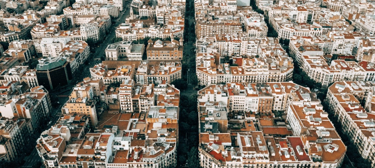 Birds eye view of the brown square sets of buildings in Barcelona, Spain