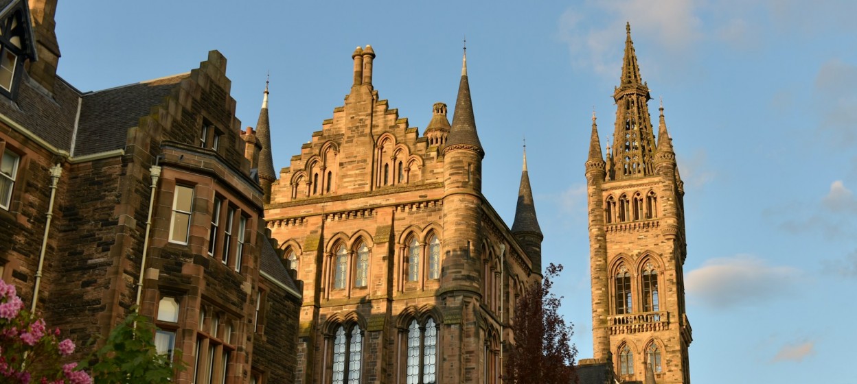 Brown concrete building during daytime at the University of Glasgow