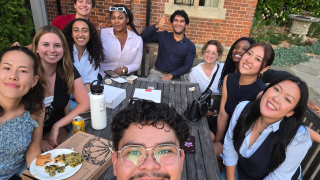 Oscar sitting with the GLOBES cohort eating lunch