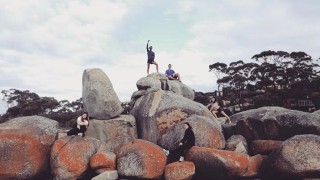 Students on rocks in Tasmania