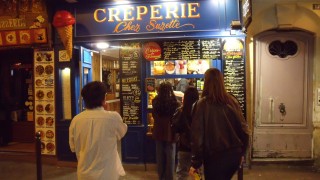 Students waiting in line to order a crepe