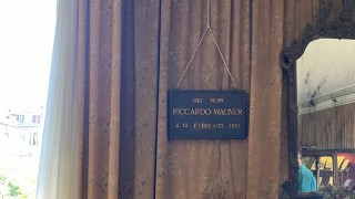 A sign in a musuem about Riccardo Wagner