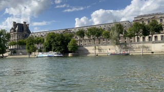 A photo looking across on the Seine river in Paris