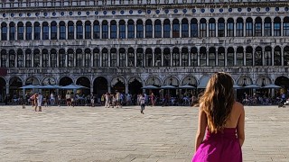 Katrina at St. Mark’s Square (Piazza San Marco), Venice, facing the Procuratie Vecchie.