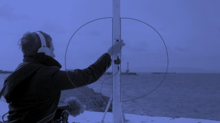 Student collecting information in Greece.