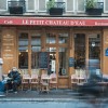 A cafe in Paris with a red aweing