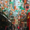 Street in Dublin with multicolored flags of Ireland during the daytime