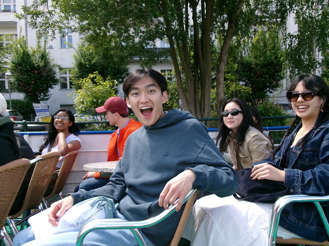 Tour Durch Berlin": Our group's first boat tour through Berlin. Arvin Kim smiling big and happy in front, along with Alicia Chang, Katherine Ruidi, and Tanisha Dakhawe.